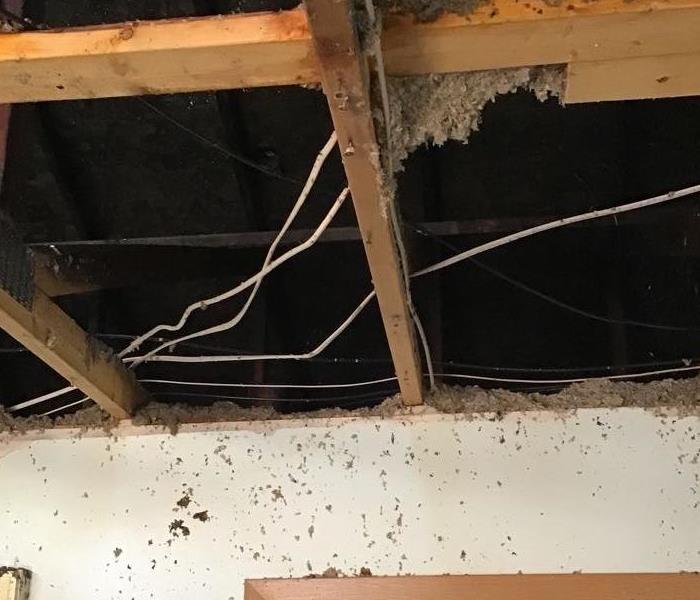 damaged house ceiling due to fire damage  
