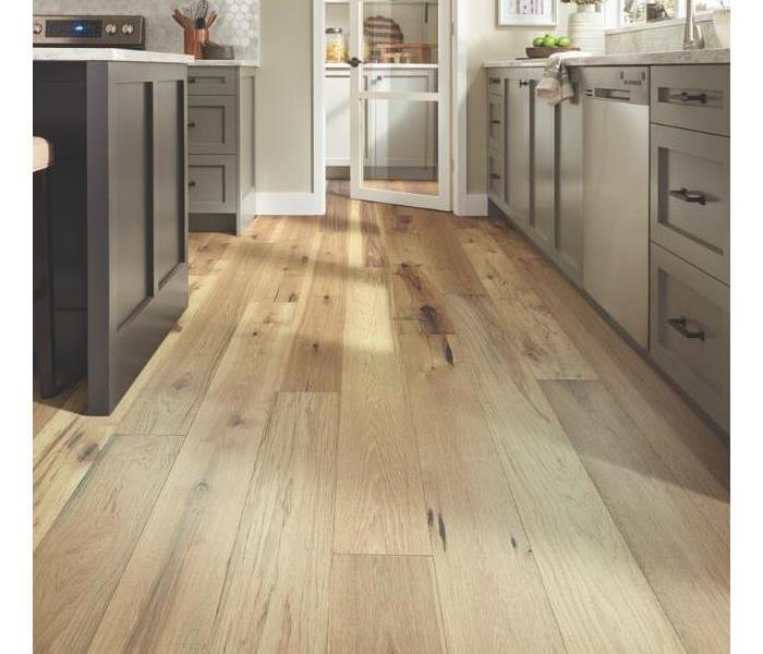 Light hardwood floors in a kitchen 